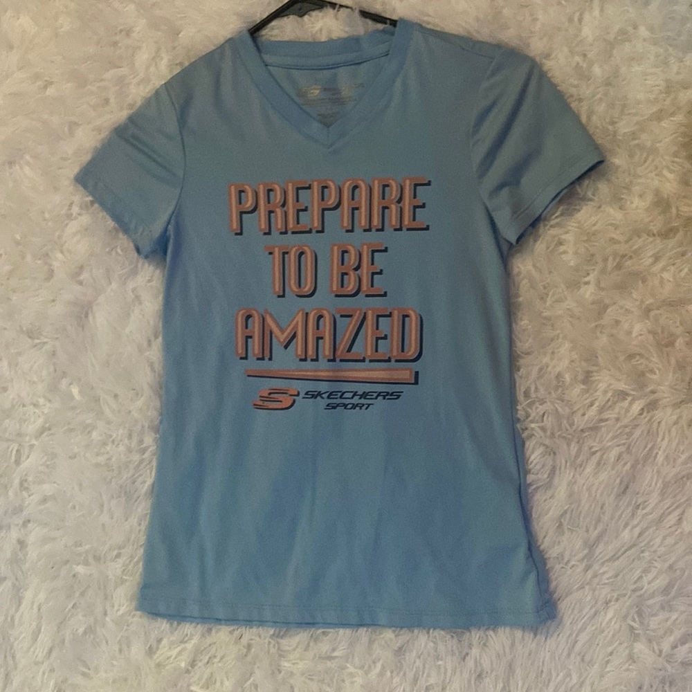 Blue athletic skechers shirt